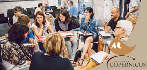 Photographie d'un groupe échangeant lors d'une conférence organisée par l’Alliance COPERNICUS.